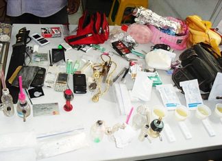 Investigators seized a pink Fino, 21 ya ba tablets, a small pack of marijuana, more than 51,000 baht in cash, gold necklace, mobile phone, knife and drug paraphernalia.